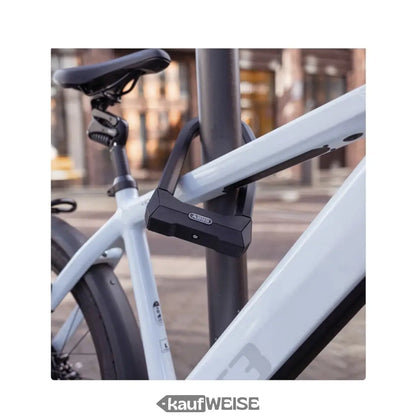 Bicycle U-Lock von ABUS Granit Super Extreme 2500 sichert Fahrrad an Pole